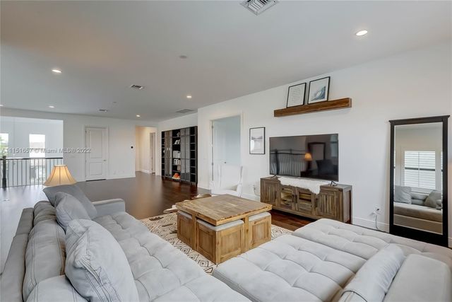 a aerial view of a house with a garden