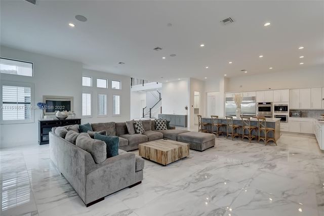 a large kitchen with lots of counter space and appliances