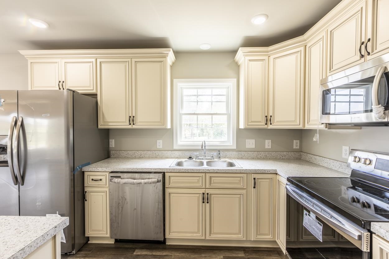 125 Rhodes Hill Drive Dayton, VA 22821 - Photo 18 of 37 a kitchen with appliances cabinets and a sink