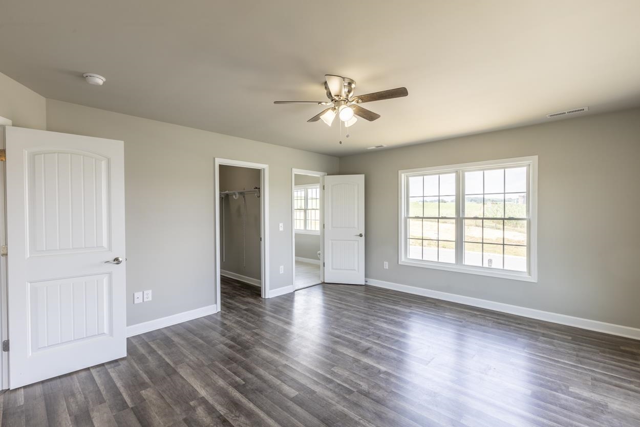 125 Rhodes Hill Drive Dayton, VA 22821 - Photo 23 of 37 a view of empty room with wooden floor and fan