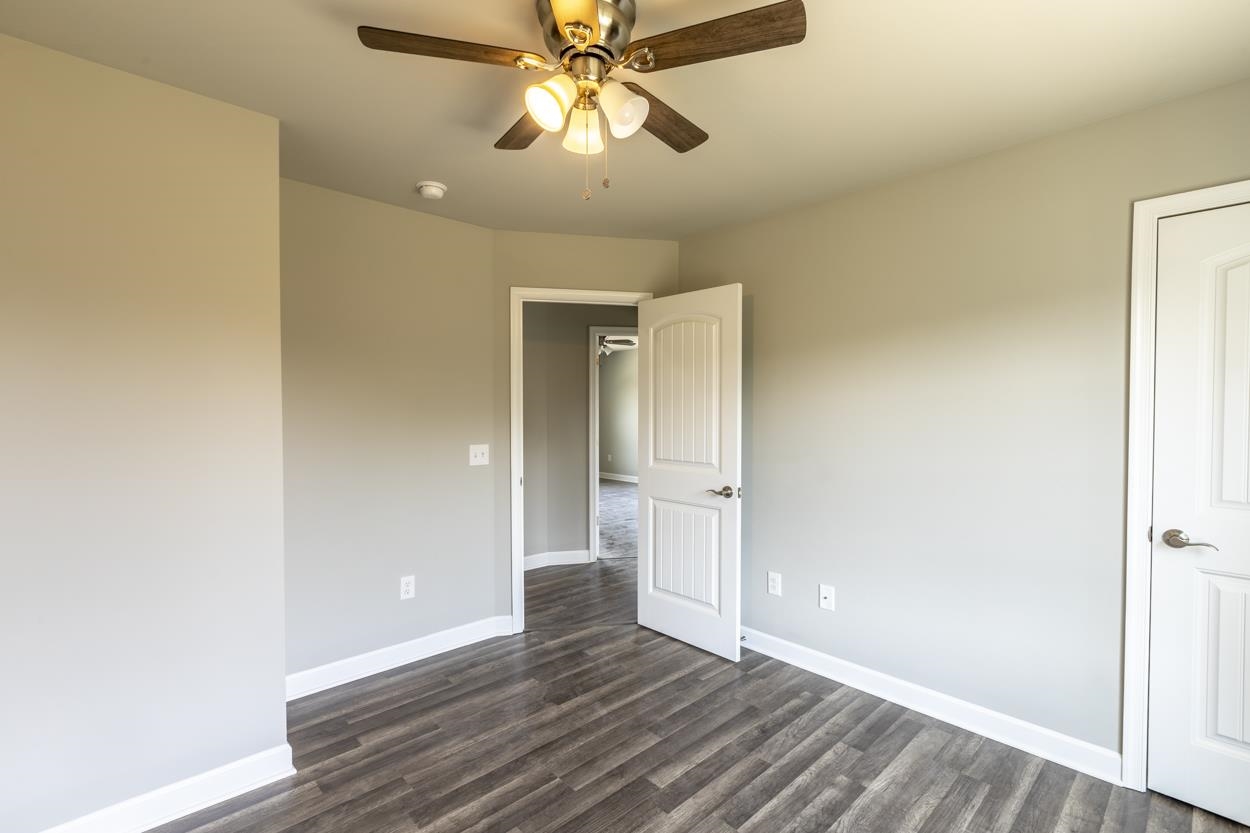 125 Rhodes Hill Drive Dayton, VA 22821 - Photo 24 of 37 a view of an empty room with wooden floor