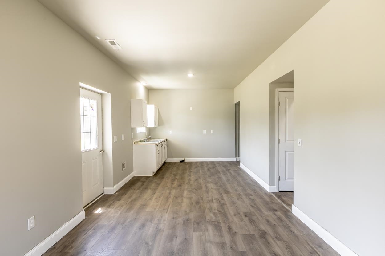 125 Rhodes Hill Drive Dayton, VA 22821 - Photo 30 of 37 a view of a room with wooden floor and window