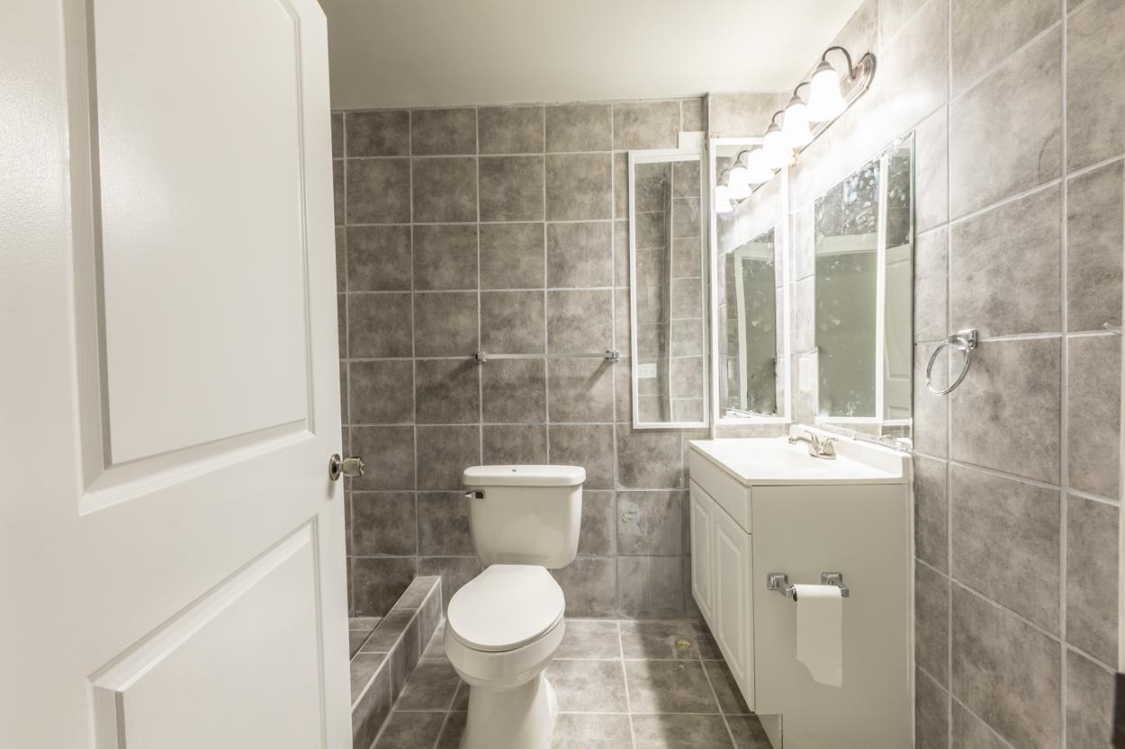 125 Rhodes Hill Drive Dayton, VA 22821 - Photo 34 of 37 a bathroom with a sink toilet and shower