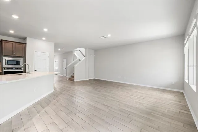 an empty room with windows