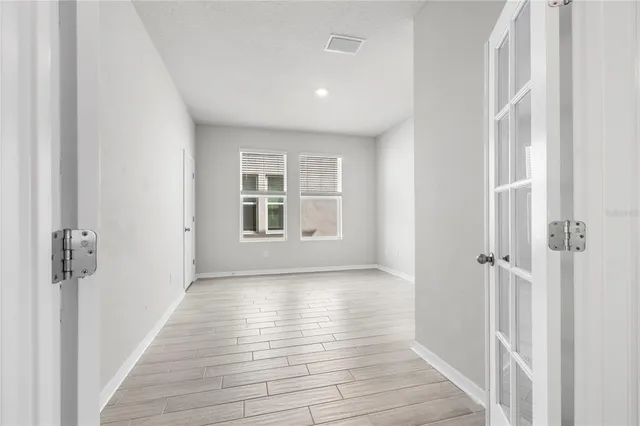 a view of a room with racks on the wall