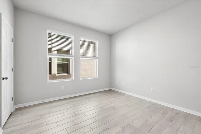 an empty room with windows