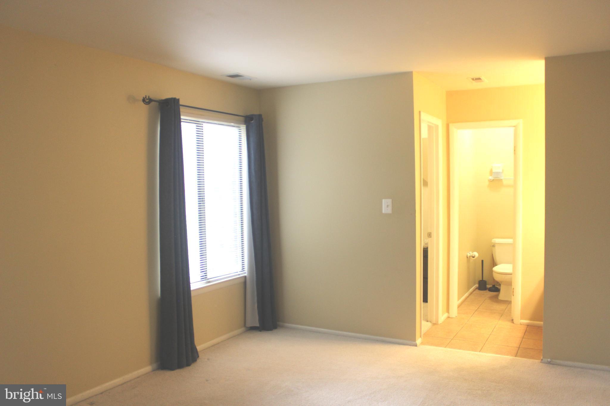 8141 Needwood Road, Unit T103 Derwood, MD 20855 - Photo 32 of 58 Main bedroom