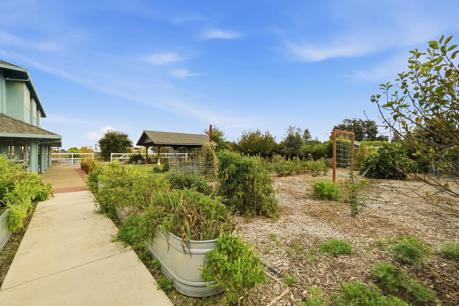 6380 Landmark Place Stockton, CA 95215 - Photo 31 of 39 a view of a house with a yard