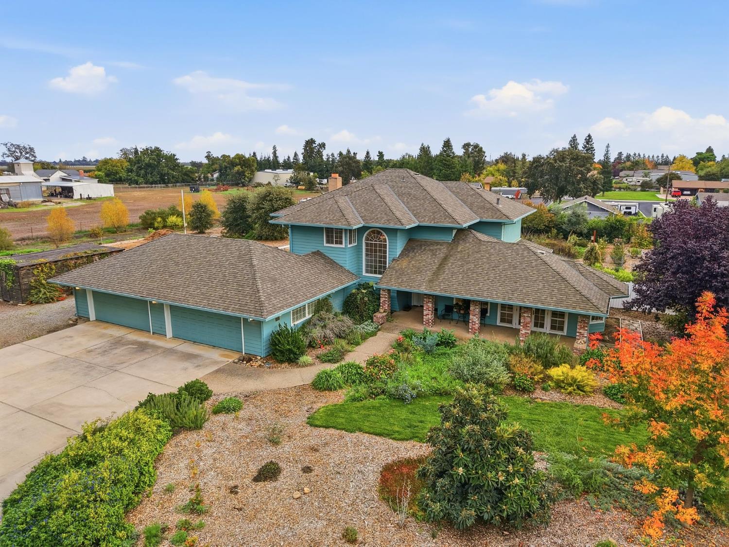 6380 Landmark Place Stockton, CA 95215 - Photo 35 of 39 an aerial view of a house with a yard and lake view