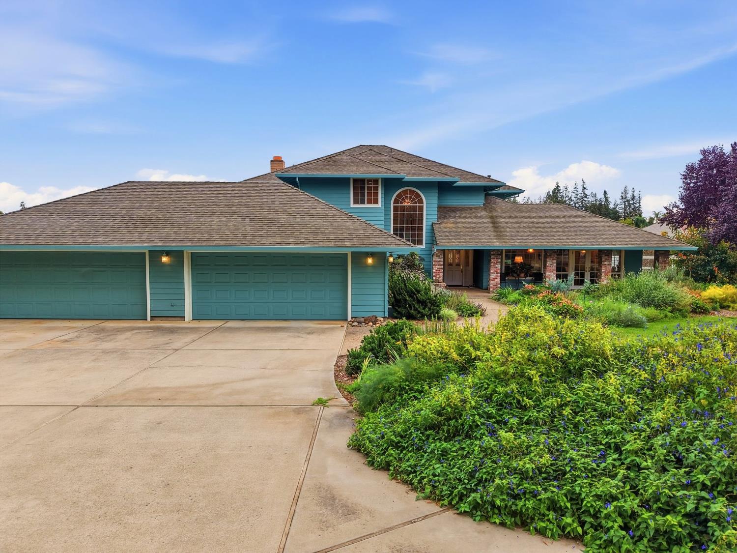 6380 Landmark Place Stockton, CA 95215 - Photo 36 of 39 front view of a house with a yard