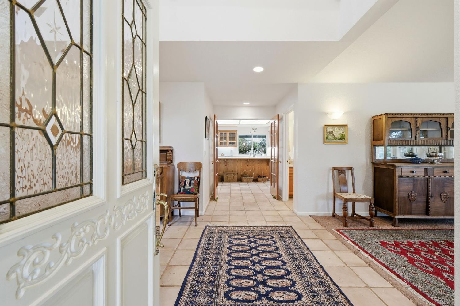 6380 Landmark Place Stockton, CA 95215 - Photo 4 of 39 a hallway with furniture and rug