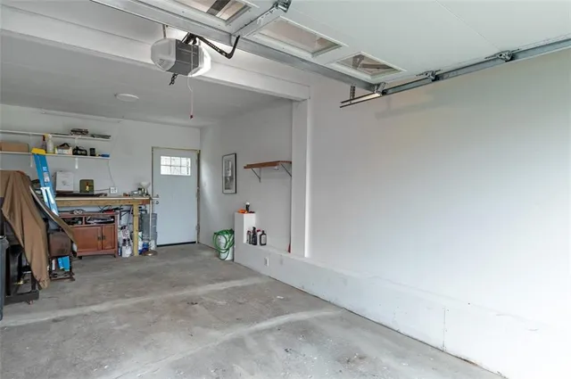 a view of a house with a wooden deck