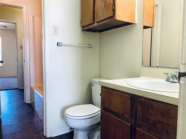 a bathroom with a sink and a toilet
