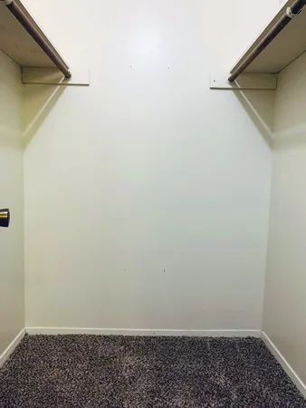 a view of small space with racks on the wall