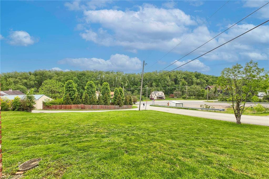 8002 Hayward Street Irwin, PA 15642 - Photo 25 of 31 a view of a fountain and a big yard