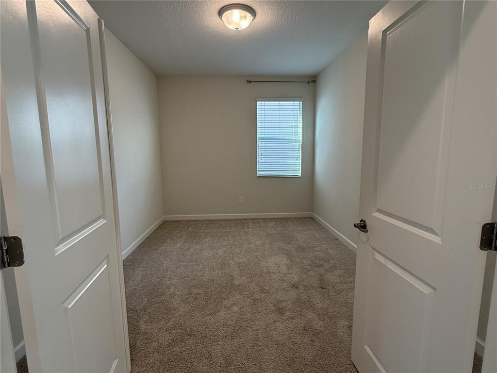 11818 Epic Avenue Orlando, FL 32832 - Photo 11 of 28 a view of room with window