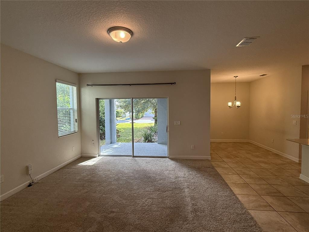 11818 Epic Avenue Orlando, FL 32832 - Photo 14 of 28 a view of an empty room with a window