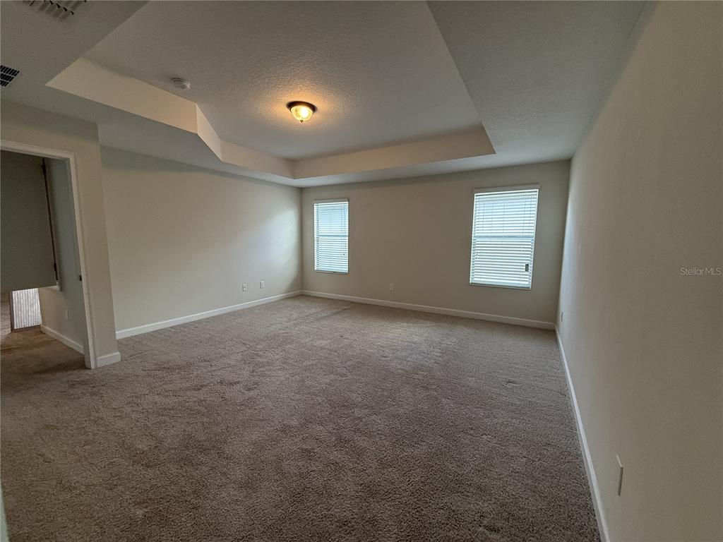 11818 Epic Avenue Orlando, FL 32832 - Photo 19 of 28 a view of an empty room with a window