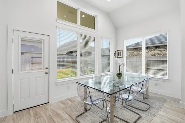 a kitchen with stainless steel appliances a stove and cabinets