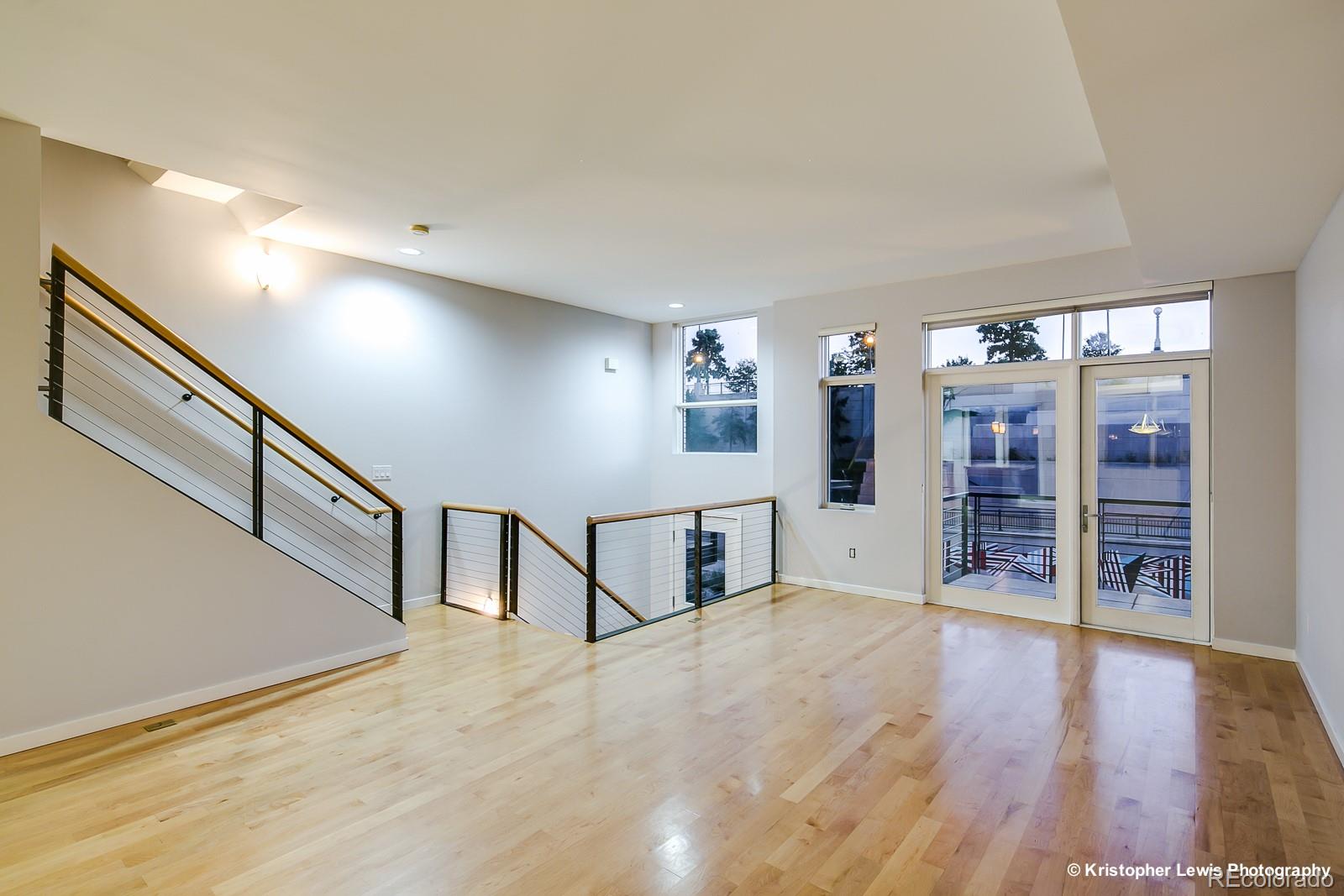 1400 Little Raven Street, Unit B Denver, CO 80202 - Photo 2 of 35 a view of an entryway with a livingroom