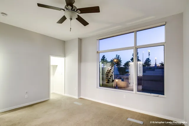 a spacious bathroom with a shower sink and mirror