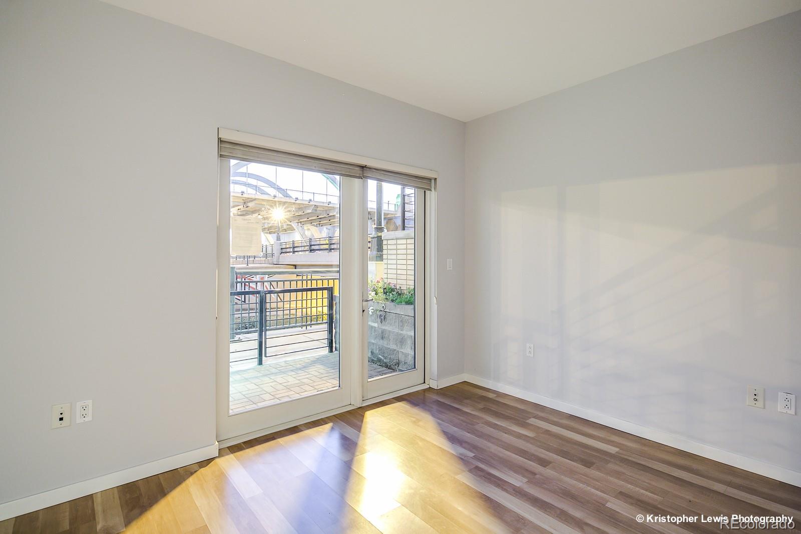 1400 Little Raven Street, Unit B Denver, CO 80202 - Photo 30 of 35 a view of an empty room and window