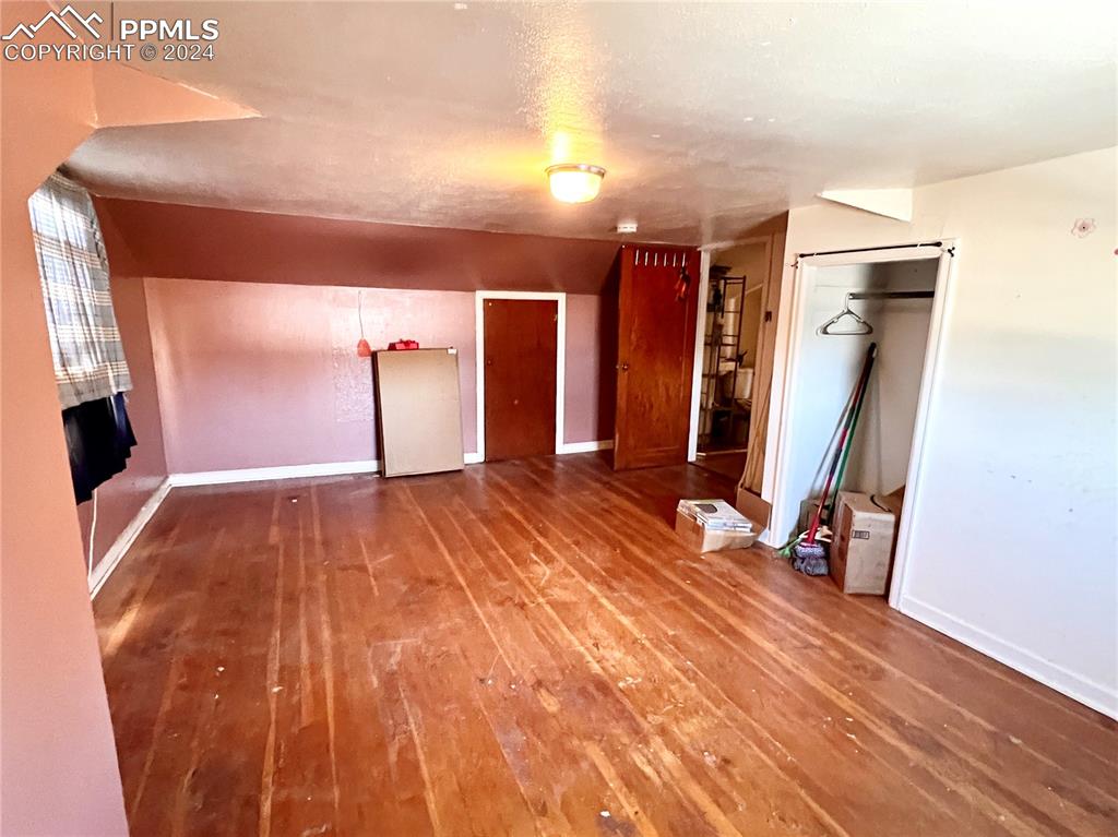 408 9th Street Fowler, CO 81039 - Photo 12 of 13 a view of a room with wooden floor