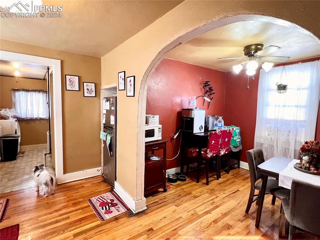408 9th Street Fowler, CO 81039 - Photo 3 of 13 a living room with furniture and a wooden floor
