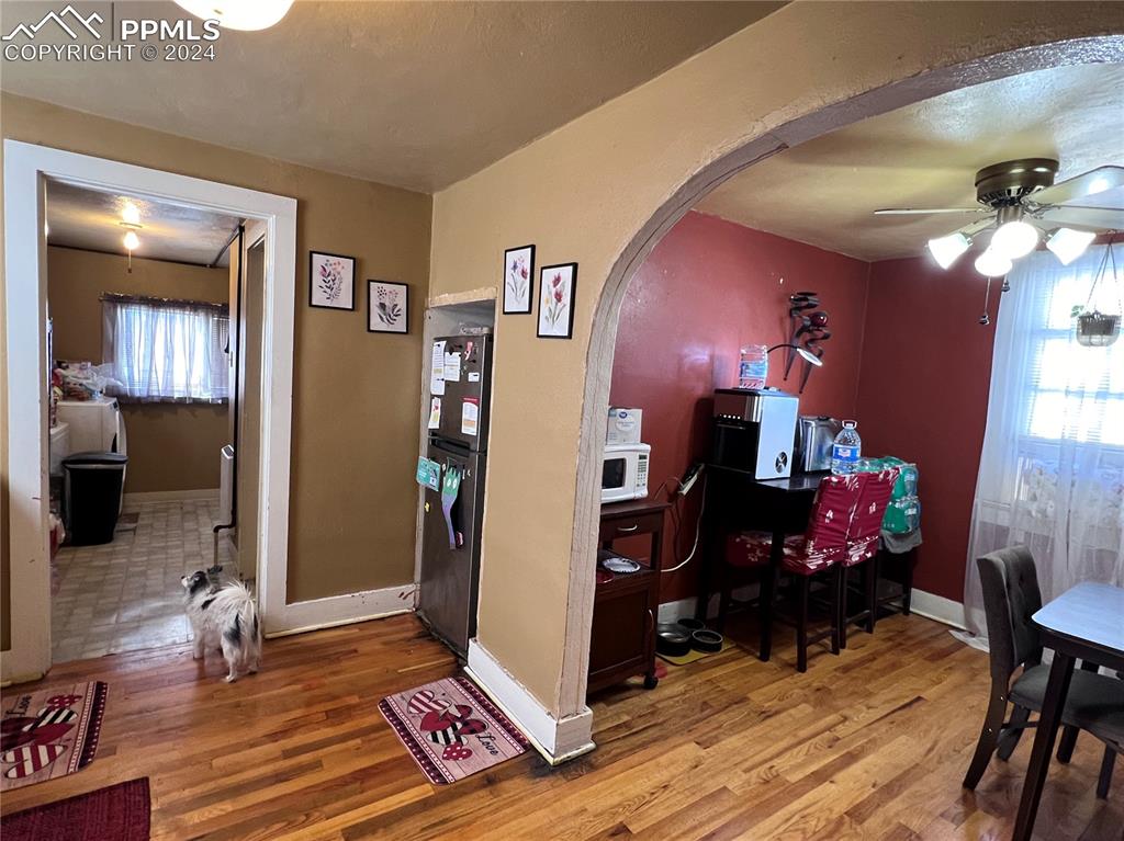 408 9th Street Fowler, CO 81039 - Photo 4 of 13 a living room with furniture and wooden floor