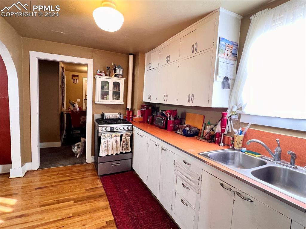 408 9th Street Fowler, CO 81039 - Photo 6 of 13 a kitchen with stainless steel appliances granite countertop a sink and cabinets