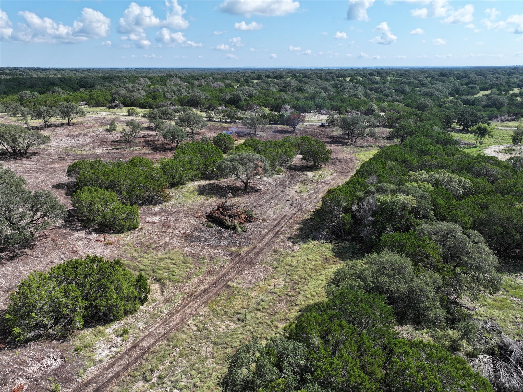 108 Rd Burnet Tx 78611 Road Lampasas, TX 76550 - Photo 8 of 9 a view of a house with a yard and lake view