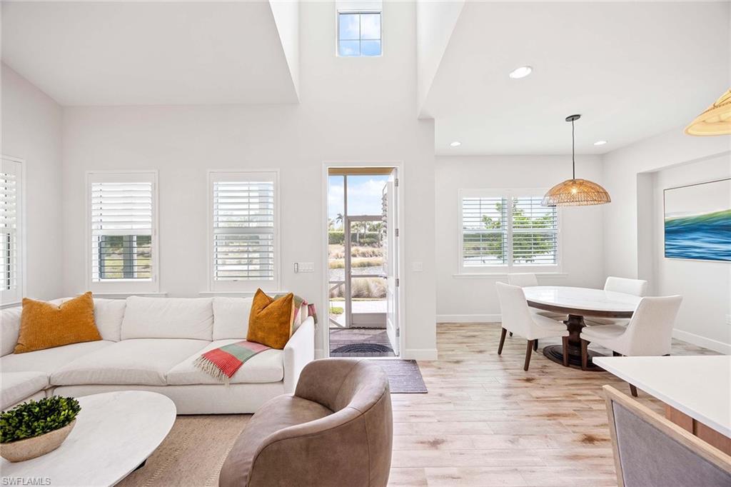 7018 Saona Court Naples, FL 34113 - Photo 4 of 29 Living space with high ceilings.