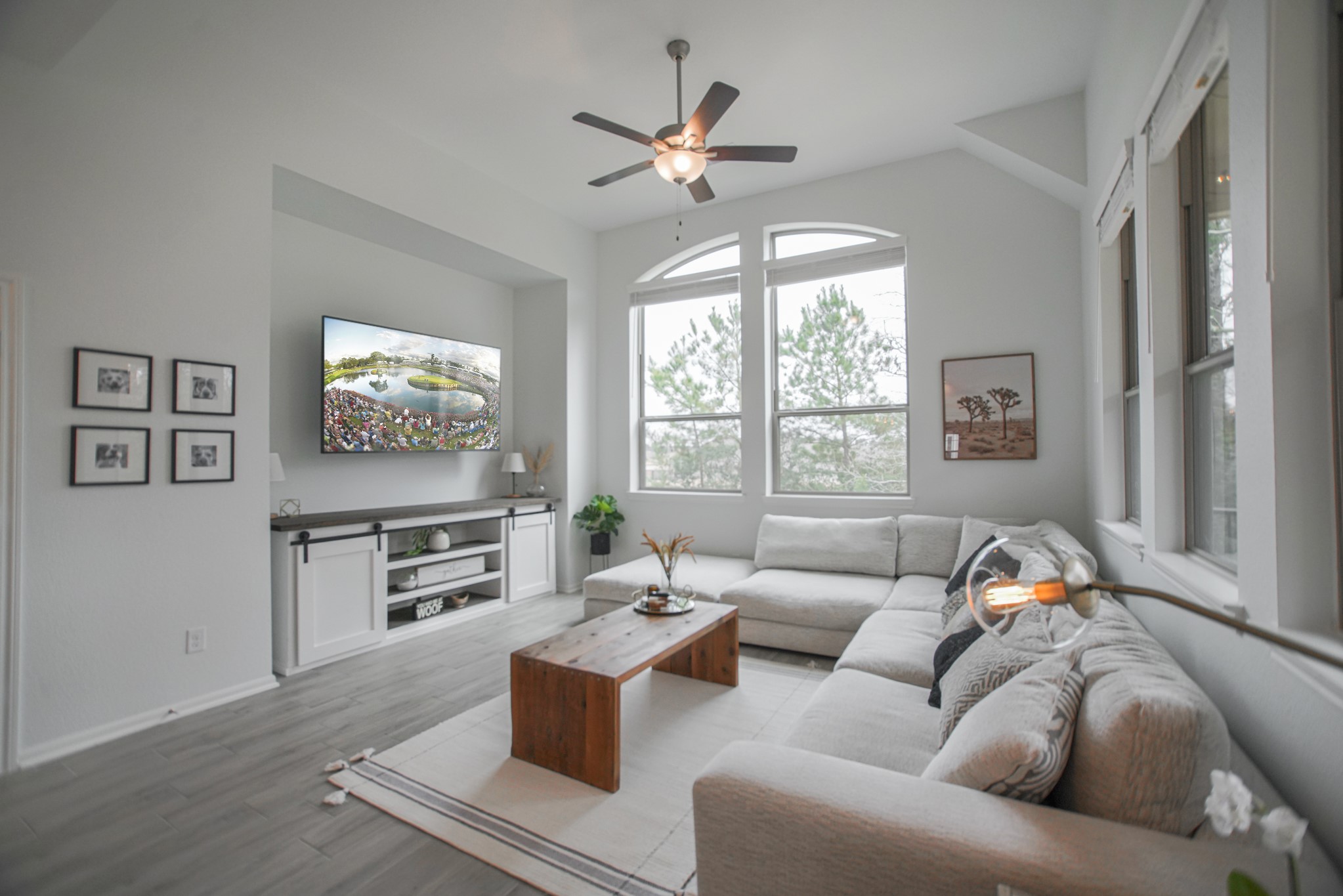 4232 Merry Mill Drive Spring, TX 77386 - Photo 19 of 50 Large family room with oversized windows overlooking the covered patio & backyard oasis.