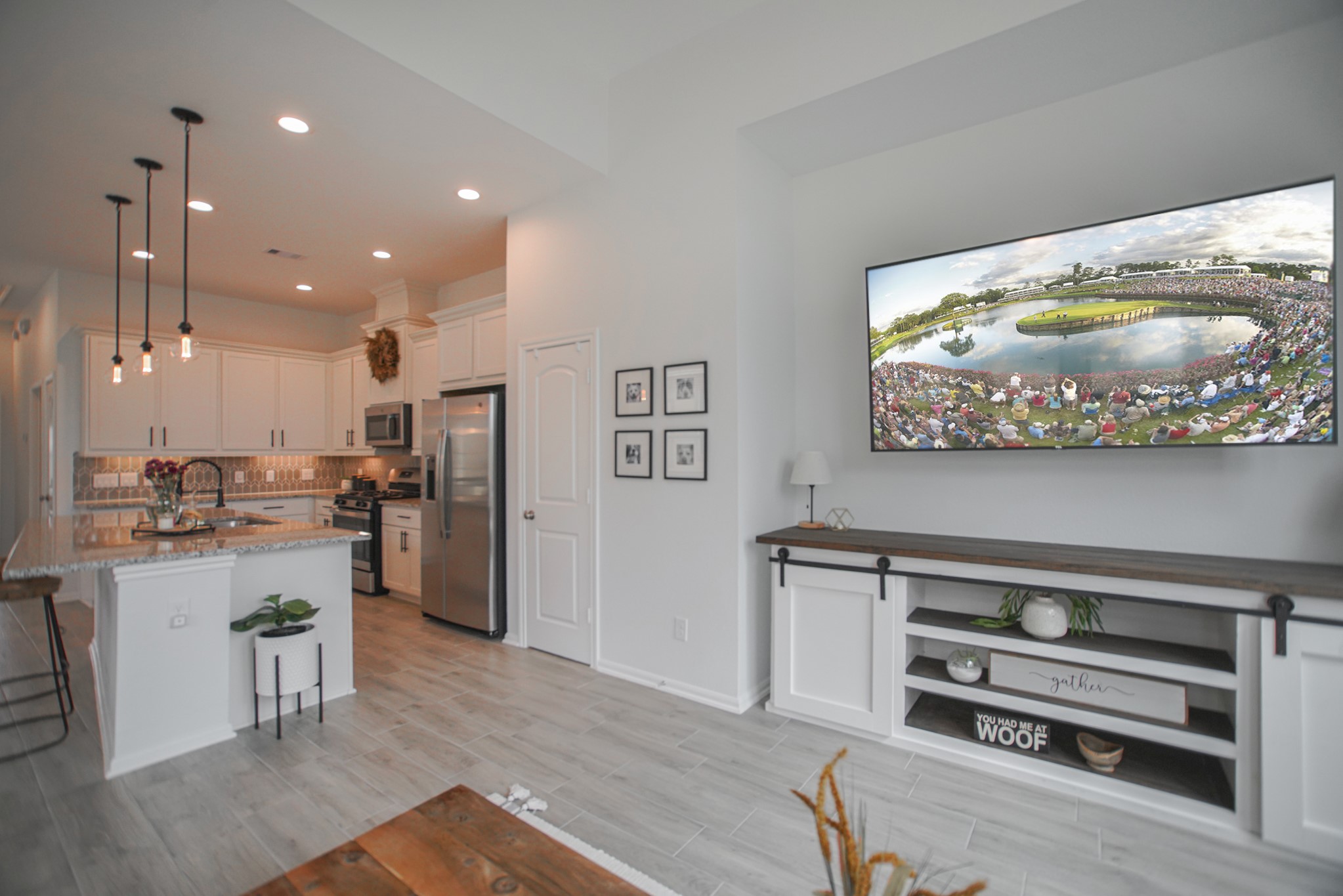 4232 Merry Mill Drive Spring, TX 77386 - Photo 24 of 50 Expansive family room with open layout, oversized windows & plenty of natural light creating the ultimate gathering space.
