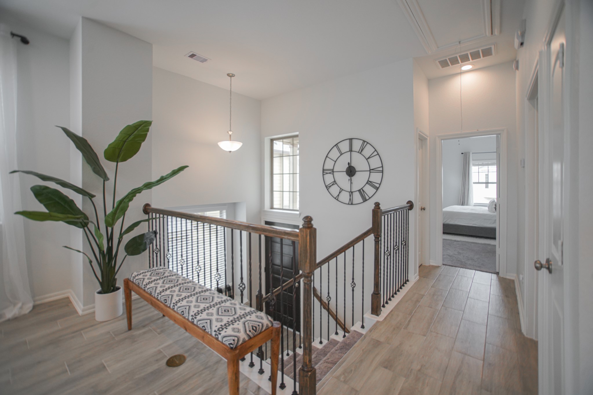 4232 Merry Mill Drive Spring, TX 77386 - Photo 26 of 50 Sunlit stairway landing with decorative nook for artwork or seasonal décor.