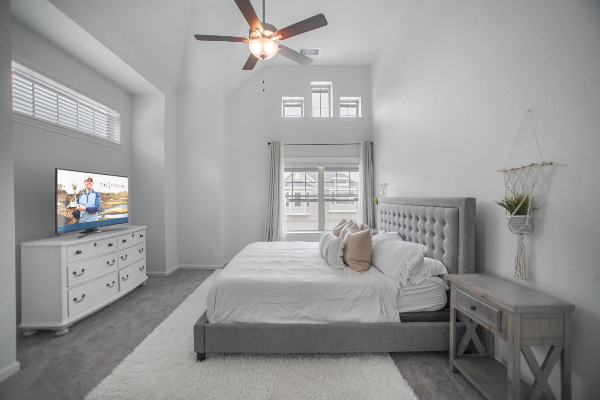 4232 Merry Mill Drive Spring, TX 77386 - Photo 27 of 50 Elegant master retreat with sloped ceilings creating a sense of openness & comfort.