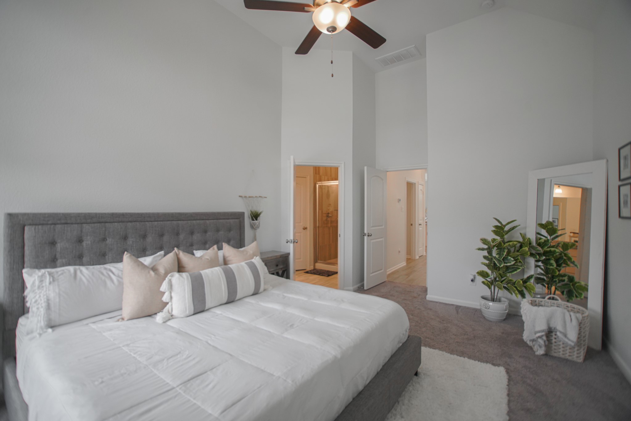 4232 Merry Mill Drive Spring, TX 77386 - Photo 29 of 50 Primary bedroom retreat feels like a sanctuary, with sloped ceilings & bright windows overlooking the yard.