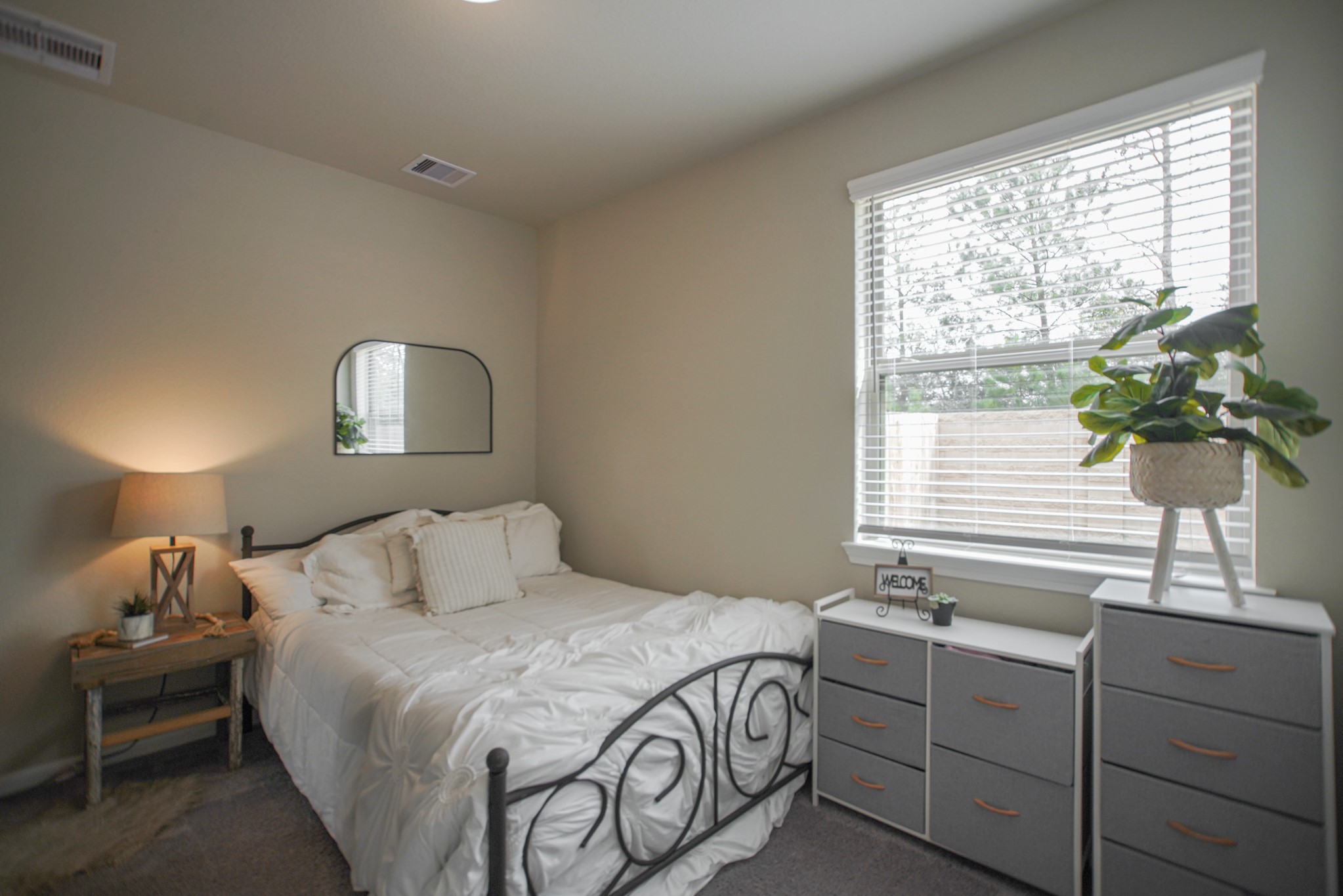 4232 Merry Mill Drive Spring, TX 77386 - Photo 42 of 50 Secondary bedroom #1 with large closet & windows designed for comfort & flexibility.