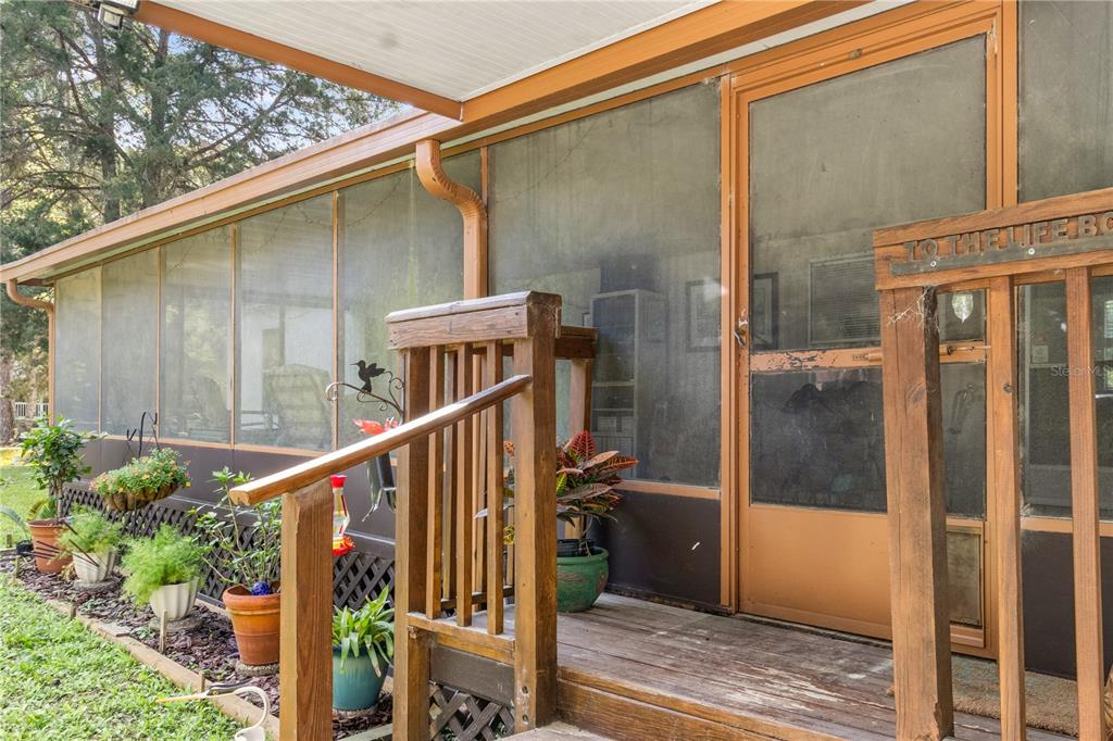 a view of balcony with wooden floor and wall