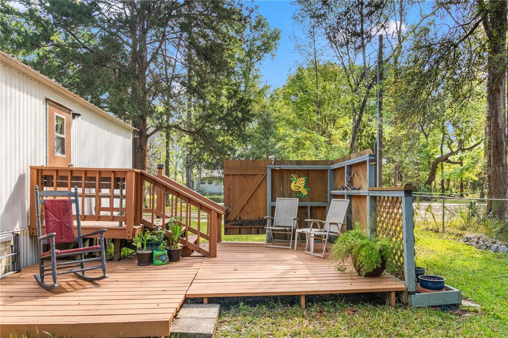 3650 176 Place Inglis, FL 34449 - Photo 32 of 52 a view of a house with backyard and sitting area