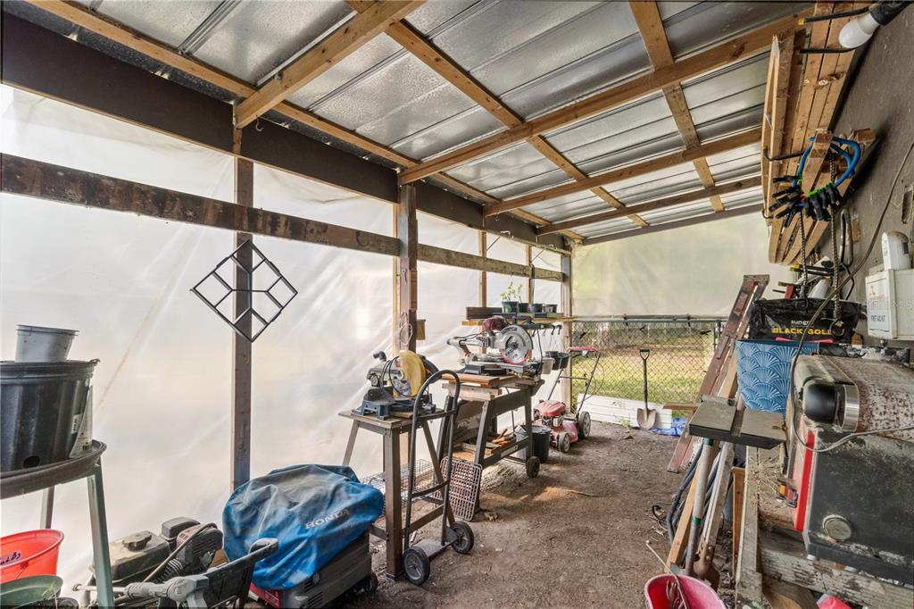 3650 176 Place Inglis, FL 34449 - Photo 40 of 52 a view of a room with gym equipment