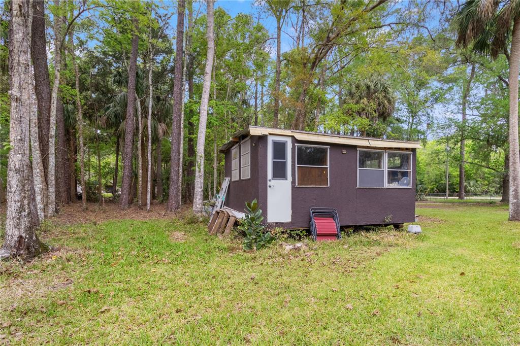 3650 176 Place Inglis, FL 34449 - Photo 43 of 52 a view of a house with backyard and garden