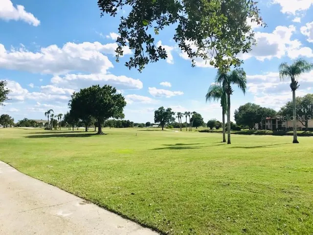 a view of an outdoor space and swimming pool