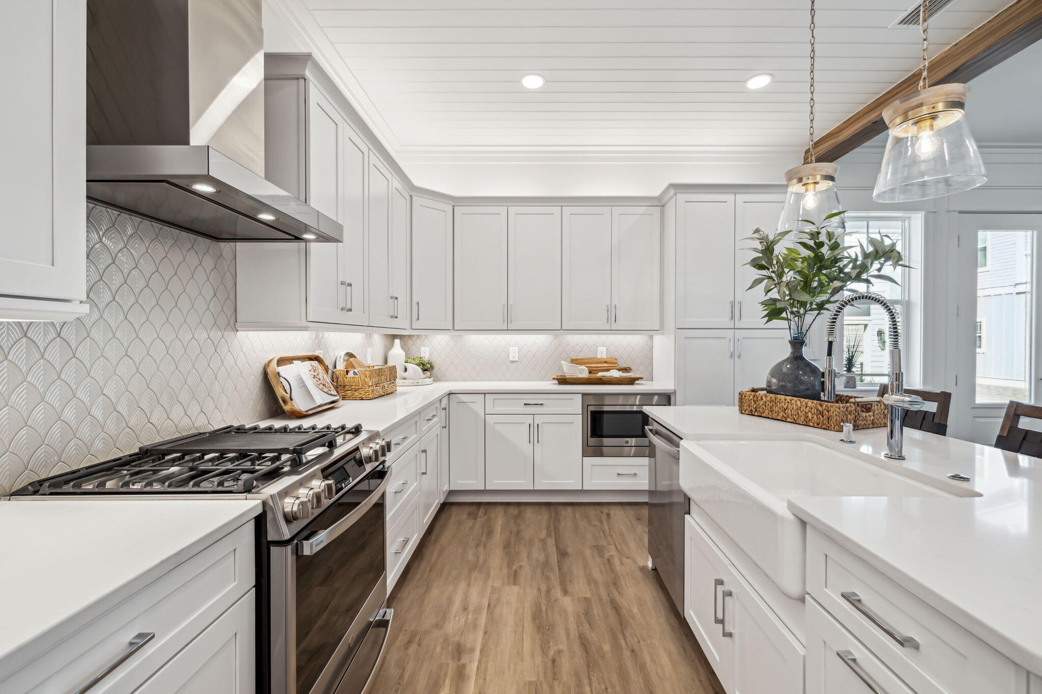 33 Grayton Boulevard Santa Rosa Beach, FL 32459 - Photo 15 of 48 a kitchen with granite countertop a sink stove and cabinets