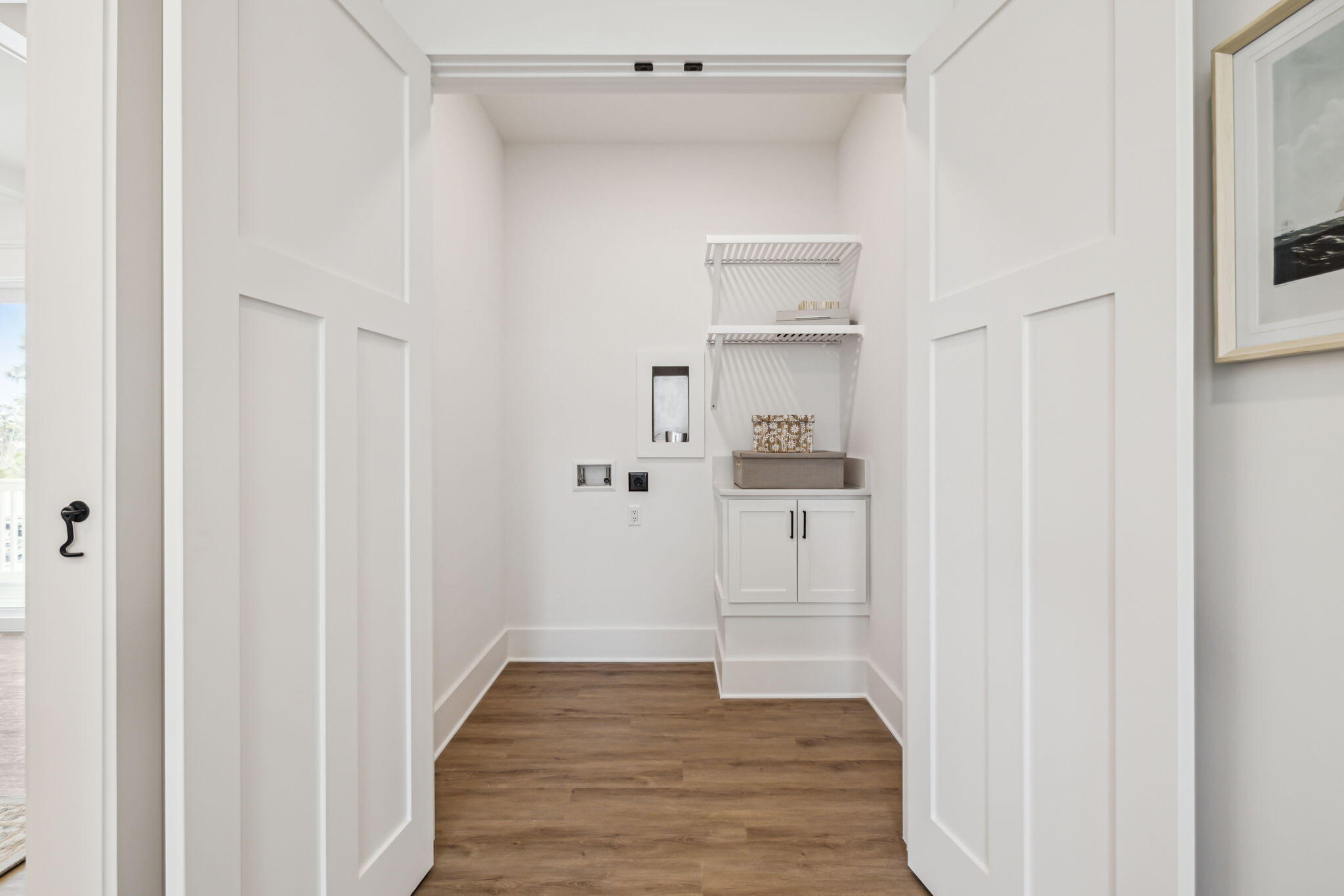 33 Grayton Boulevard Santa Rosa Beach, FL 32459 - Photo 22 of 48 a view of a hallway with wooden floor