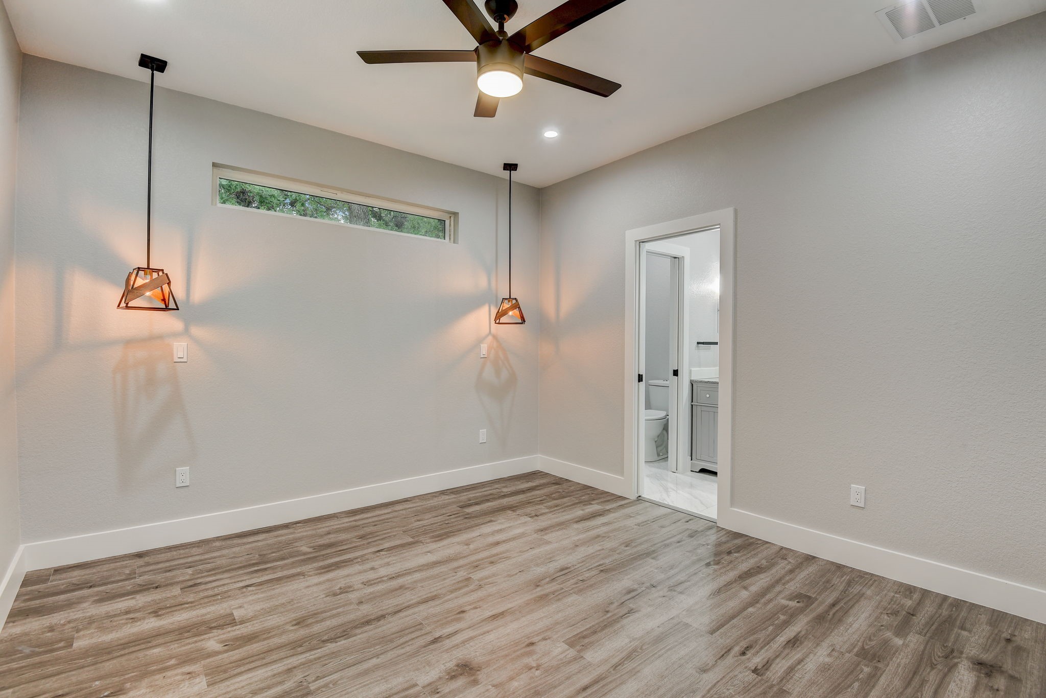 2507 Rogge Lane, Unit 2 Austin, TX 78723 - Photo 21 of 30 wooden floor in an empty room