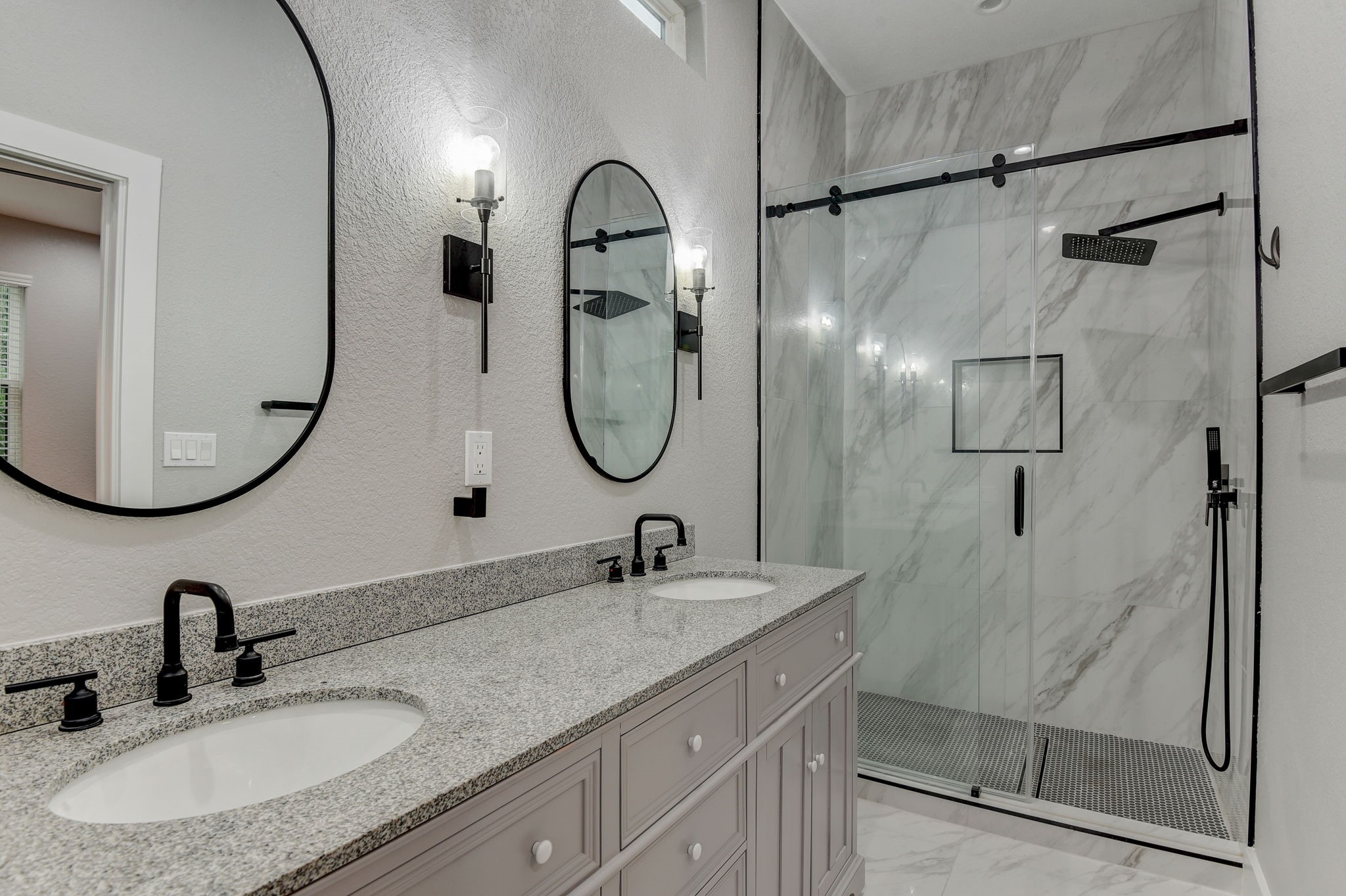 2507 Rogge Lane, Unit 2 Austin, TX 78723 - Photo 3 of 30 a bathroom with a sink and a mirror