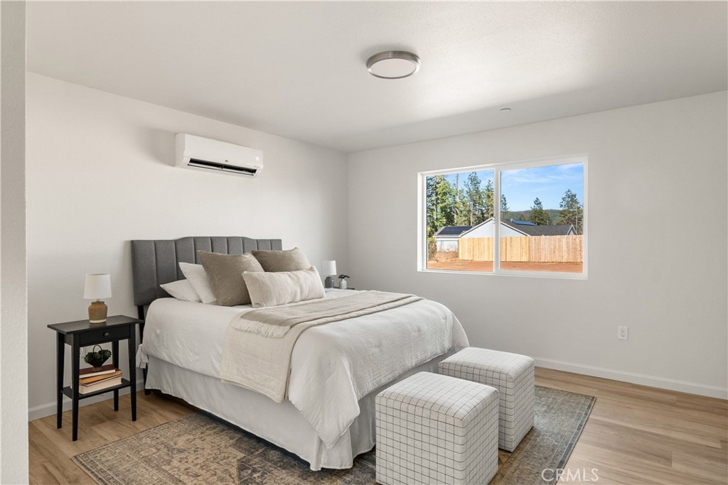 5956 Kibler Road Paradise, CA 95969 - Photo 17 of 36 a bedroom with a bed and a window