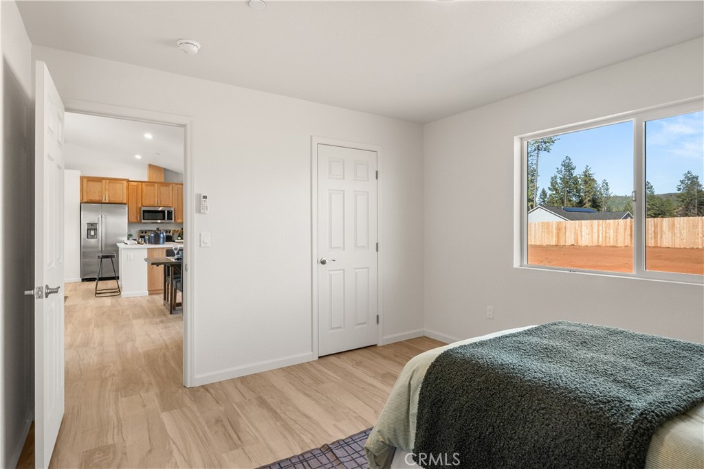 5956 Kibler Road Paradise, CA 95969 - Photo 22 of 36 a bed room with a bed and a window