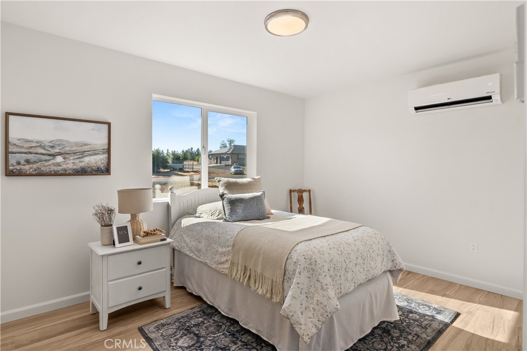 5956 Kibler Road Paradise, CA 95969 - Photo 23 of 36 a bedroom with a bed and a window